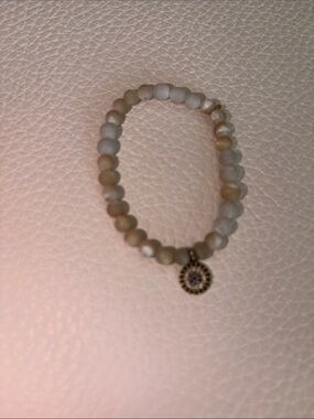 Sydney Evan Beige Matte Beaded Stretch Bracelet with Sunburst Pendant